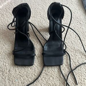 1 Pair of Black Strapy Heels